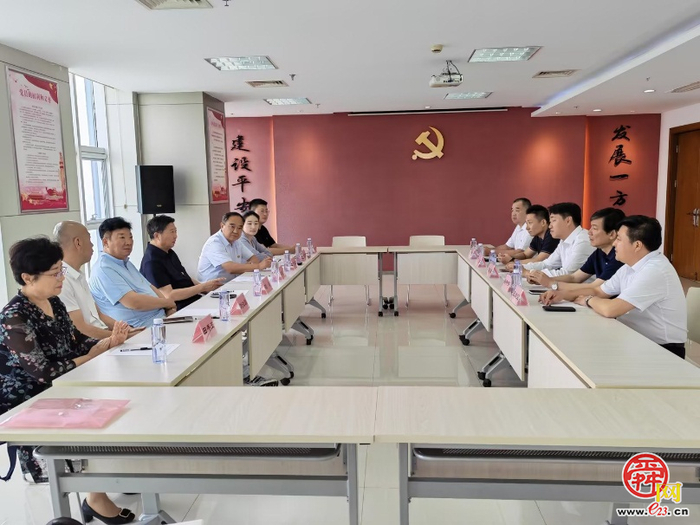 济南市商业联合会赴泺口服装公司开展党建主题交流活动