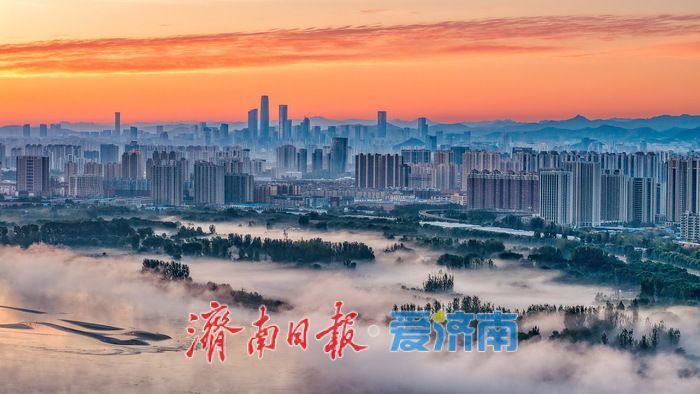 美若仙境！雾漫黄河破晓时，百年铁桥揽霞开