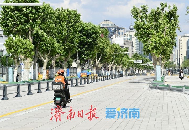 泉城路改造迎收官，西段快车道允许非机动车临时通行