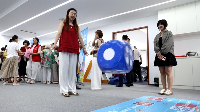在游戏中让工伤预防知识悄然入心 2025济南市工伤预防宣传活动走进市中区兴润社区