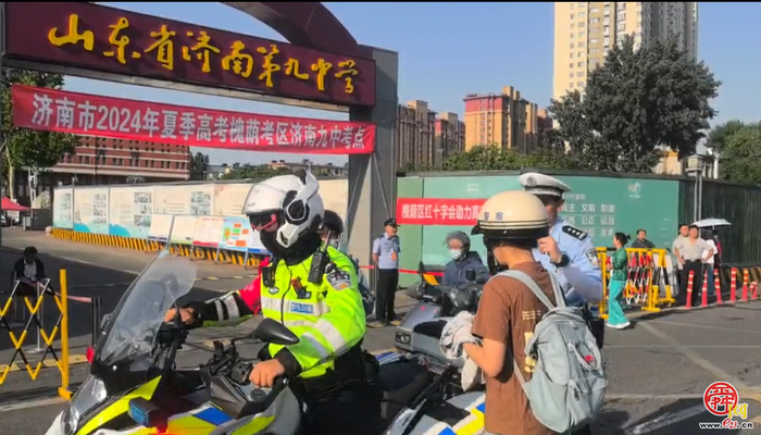 考生电动车出故障  交警暖心护送