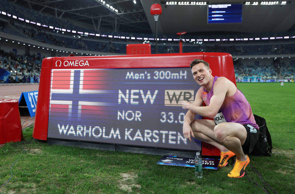 瓦霍尔姆刷新300米栏历史最快成绩