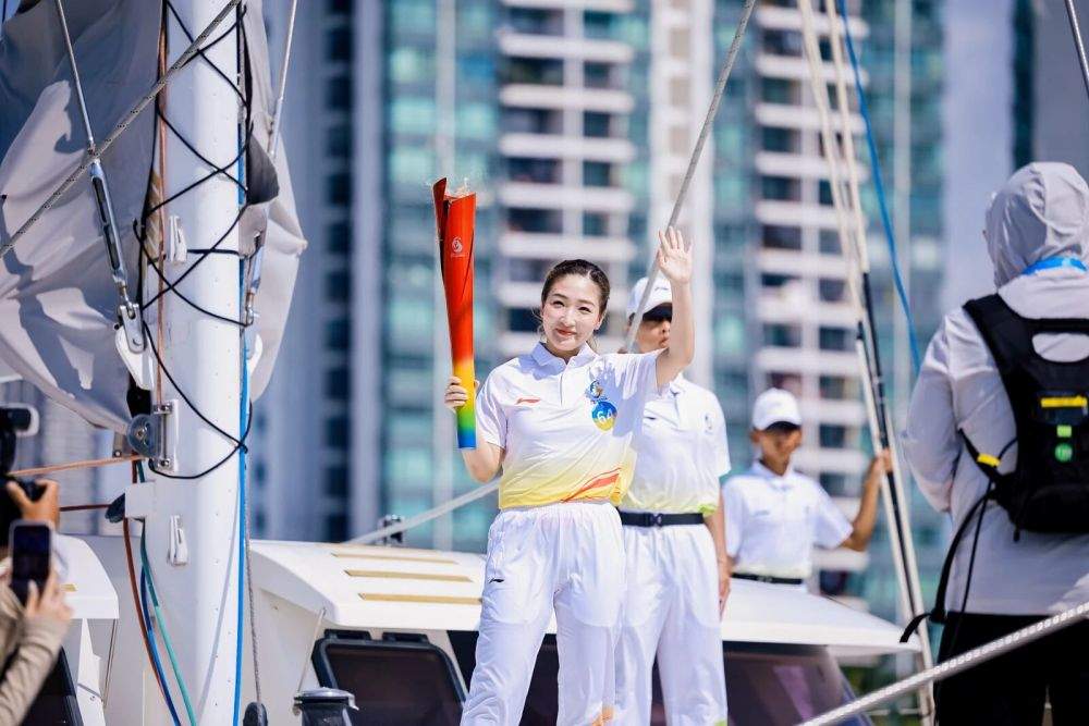追光｜74位火炬手，把热情和海风一起传递