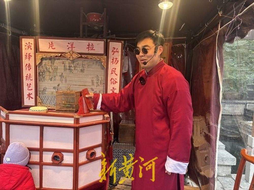 非遗里的春节｜小圆孔藏着大世界！德州非遗“拉洋片”亮相大明湖