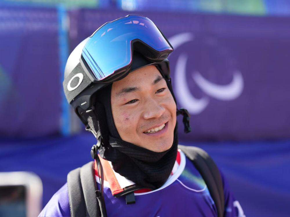 越坚持，越幸运——记米兰冬残奥会残奥单板滑雪冠军武中伟