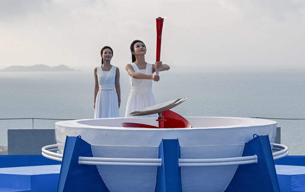 追光｜74位火炬手，把热情和海风一起传递