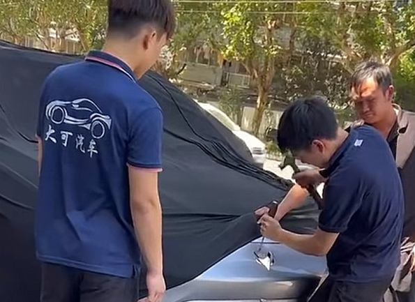 欲盖弥彰！女子称新车自燃厂家第一时间撬标 极狐客服回应