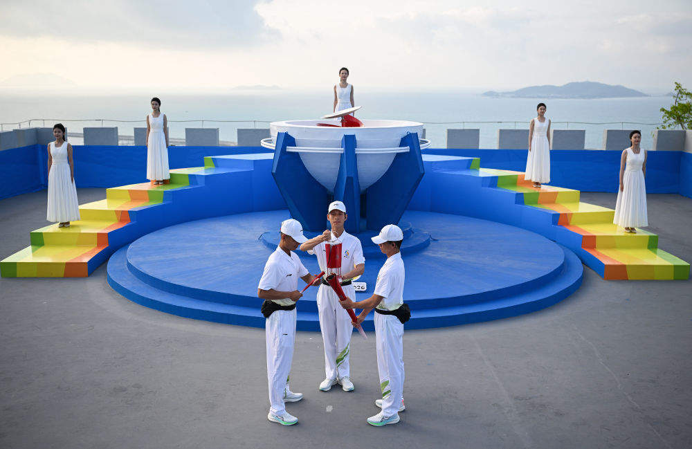 追光｜74位火炬手，把热情和海风一起传递